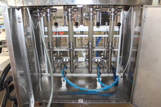 PÅFYLDNINGSMASKINE 4 hoveder (2).JPG