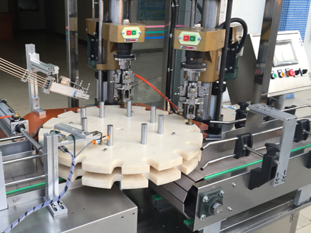 capping head dobbelthovedet skruelåg.jpg