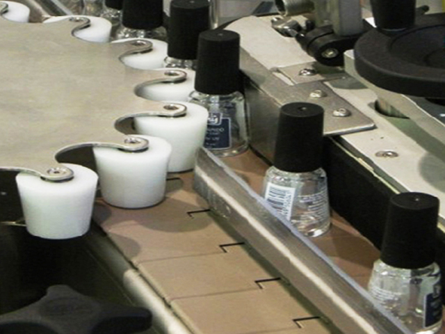 flasker med drejeligt stjernehjul til etikettering.jpg