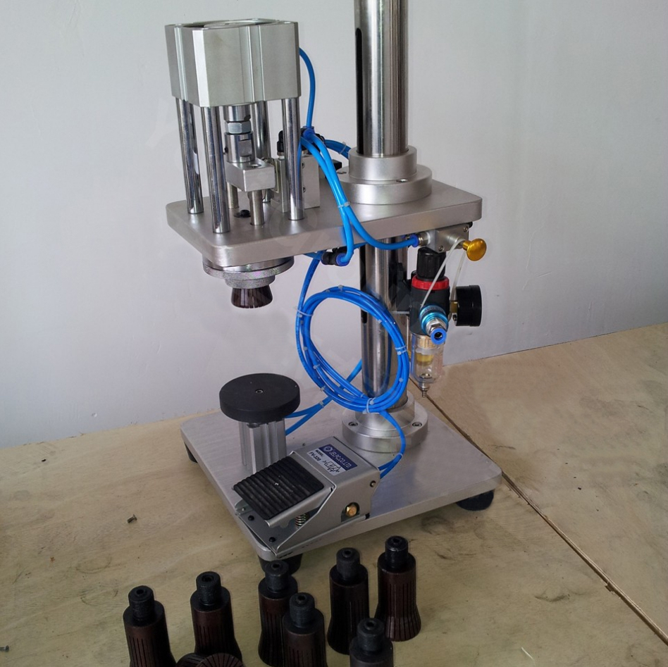 manual crimping machine for glass bottles pneumatisk afdækningsudstyr semiautomatisk pneumatisk.jpg