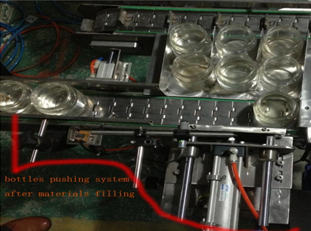 automatic bottles pushing system after filing flaskeskubbesystem.jpg