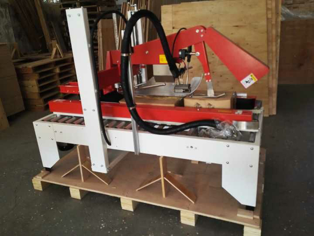 smeltelim kartonforseglingsmaskine.jpg